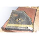 A wooden Royal Piano Zither The zither, of typical form sold by The Oxford Academy of Music with