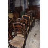 A matched set of six 18th/19th Century ash ladder back kitchen chairs Each chair with a ladder