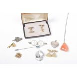 A selection of jewellery To include brooches, pendants, stick pins etc