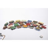 Twenty-six unboxed French Hornby '0' gauge rolling stock items Comprising barrel wagons, open