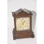 A late 19th/early 20th Century Winterhalder & Hofmier walnut cased bracket clock The architectural