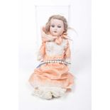 A bisque headed doll With blonde wig, open/shut blue eyes, open mouth, impressed mark 370, with