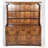 A good quality reproduction George III style oak high back dresser, 20th Century The cavetto cornice