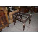 A Mid 20th Century draw leaf oak dining table The rectangular cleated table top with two extra