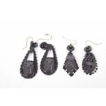 Two pairs of late Victorian jet earrings Each designed as a foliate jet carving with hook fitting (