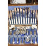 A wooden cased set of silver plated cutlery To include dinner knives, six luncheon knives, six