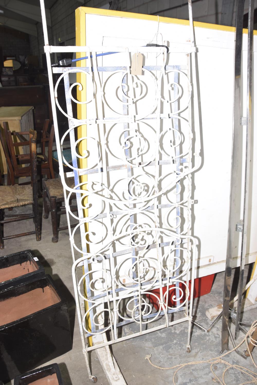 A late 19th/early 20th Century French folding ironwork bed Constructed from hinged painted iron