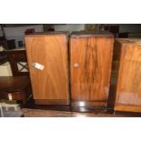 A near pair of 1930's Art Deco walnut pedestal pot cupboards Each cupboard with a square top and