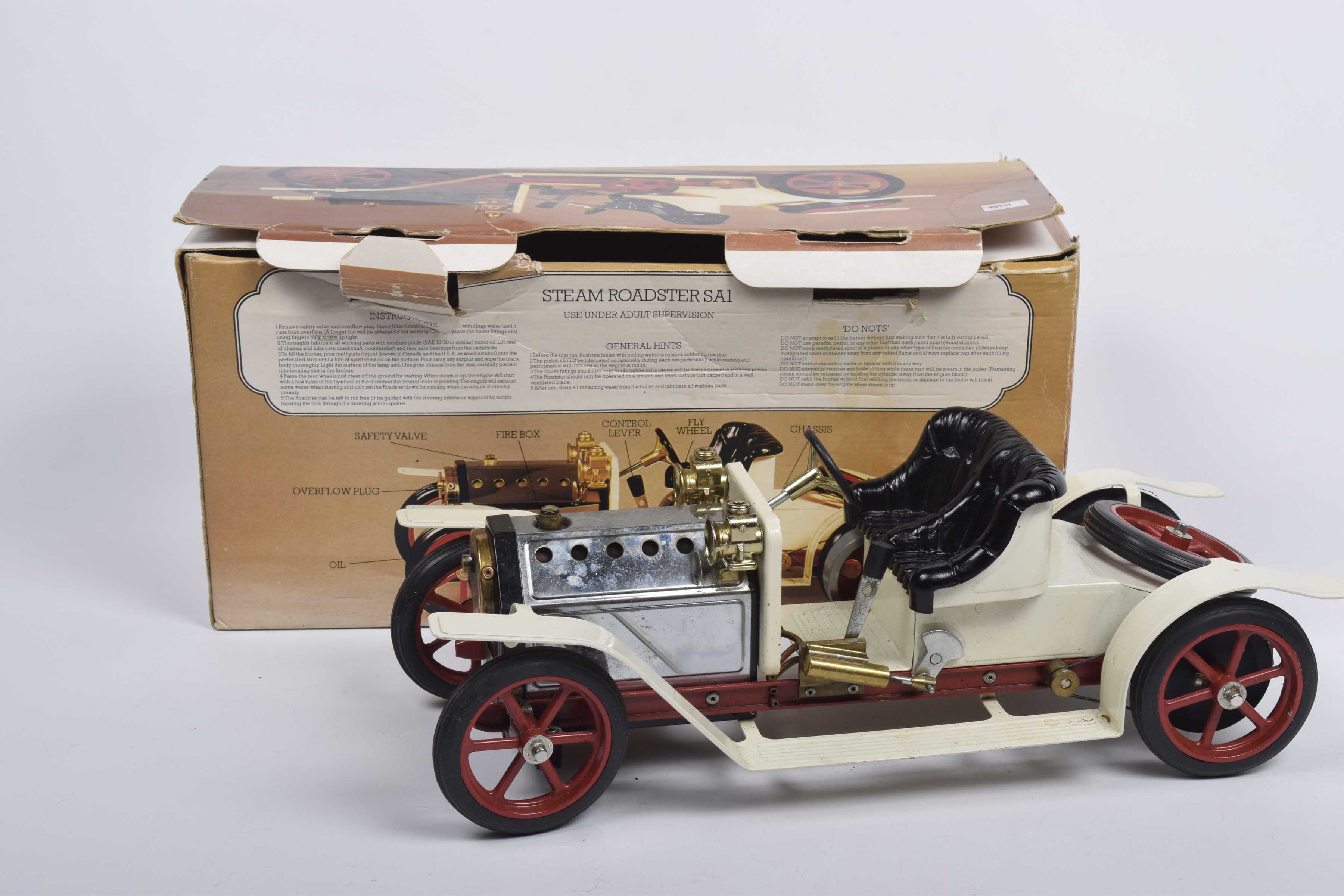 A boxed Mamod steam roadster SA1 White body with black seat, chrome bonnet and red chassis and wheel