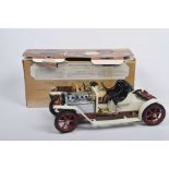 A boxed Mamod steam roadster SA1 White body with black seat, chrome bonnet and red chassis and wheel