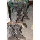 A pair of Victorian cast iron patio table stands Each constructed from two foliate openwork