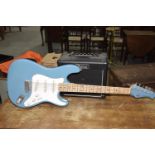 A Hondo deluxe series 760 stratocaster copy electric guitar Serial number H760BL, along with a