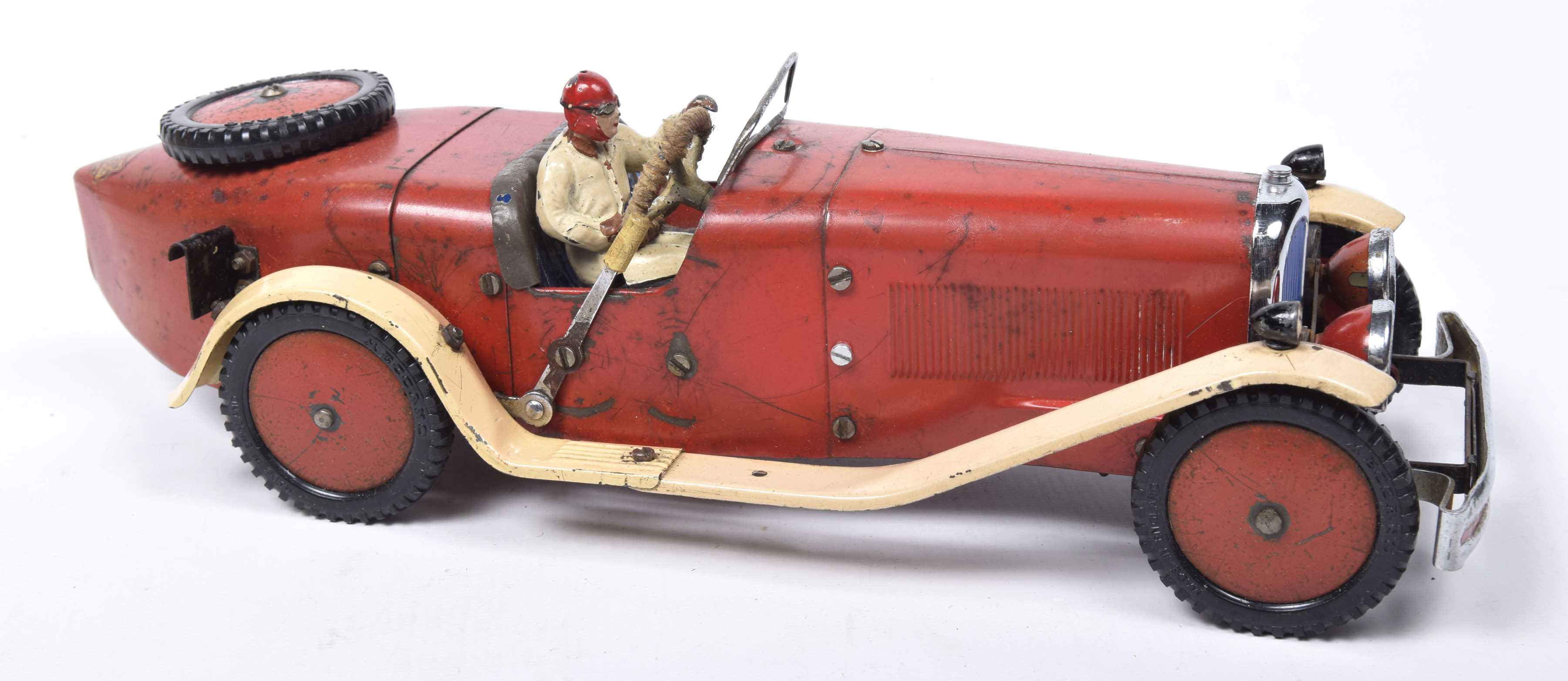 An unboxed Meccano motor car constructor outfitComprising a built ...
