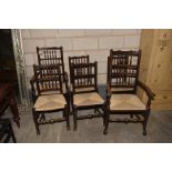 A matched set of six 18th/19th Century elm and beechwood Lancashire kitchen chairs Each with a