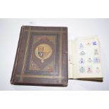 A collection of arms, crests and monograms, late 19th Century Comprising two albums, the first