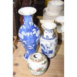 A group of three Chinese ceramics To include Chinese blue and white 'Prunus' pattern baluster