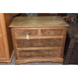 A late Victorian ash chest of drawers Having a rectangular moulded top above two short and two
