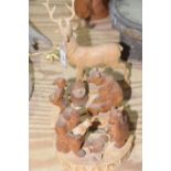 A carved wood model of a stag with antlers, late 20th Century Pair of carved wood book ends, in