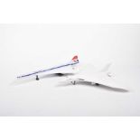 A scale model of Vulcan Bomber In British Airways livery and a Joustra French model of a Concorde