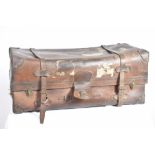 An impressive early 20th Century leather travel trunk The substantial trunk fitted with two