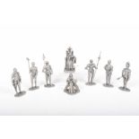 A collection of eight metal figures Comprising King Arthur, Queen Guinevere and six Knights of the