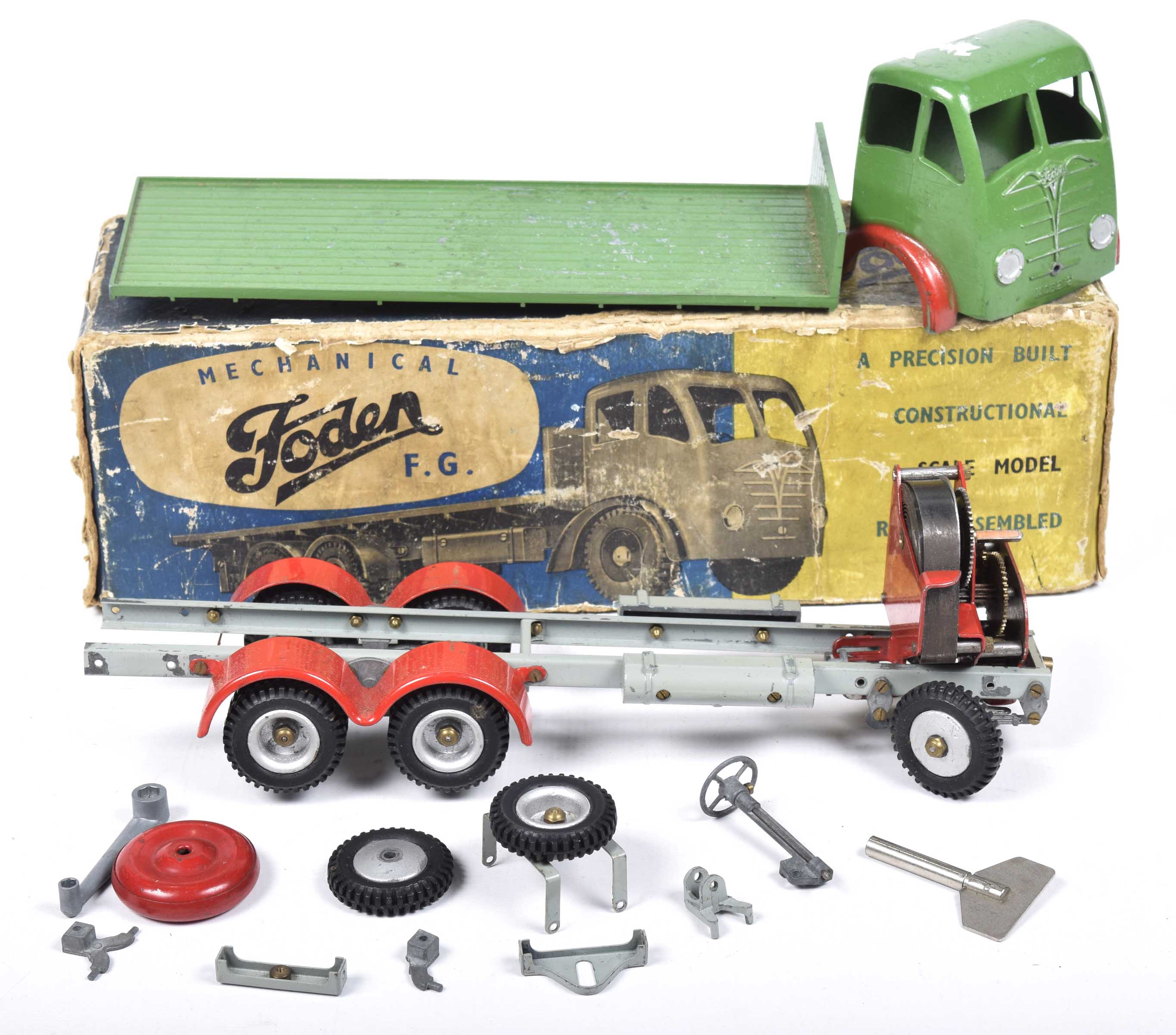 A boxed Shackleton Toy mechanical Foden FG lorry With green cab and back with tail board, grey