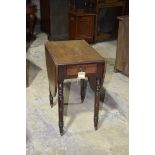 A 19th Century mahogany Pembroke table The rectangular top with deep oval leaves above a single