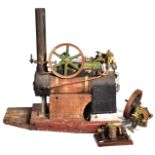 A substantial scratch built live steam stationary engine With fire box, pistol with wheel and