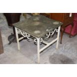 A hardwood and painted iron patio table The square hardwood top supported on a tubular iron frame