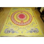 A large 20th Century Aubusson style floor rug Decorated with a large circular motif on a yellow