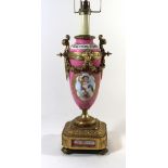 A 19th Century French porcelain and gilt metal table lamp By P.H. Mourey, the porcelain section hand