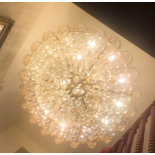 Two impressive contemporary ceiling light fittings Of circular form, fitted with twelve bulbs and