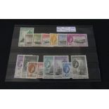 Fifteen 1954 mounted mint Falkland Island Dependencies stamps Including ten shilling and one pound