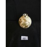 A Royal Worcester small pot pourri jar of globular form, decorated with foliage, pattern no 1039.
