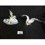 Two small Lladro bird models, a crane and a mother swan (2)