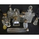 A collection various cut glass dressing table bottles and jars to include examples with hallmarked