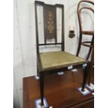 A pair of Arts & Craft mahogany side chairs by J S Henry The backs inlaid with floral detail over