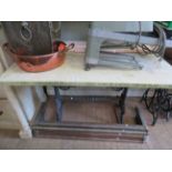 A Victorian cast iron table with a rectangular marble top