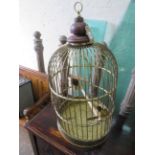 A large early 20th Century brass bird cage Of circular form, height 90cm, diameter 46cm