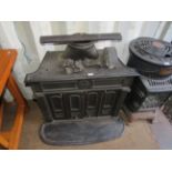 A modern cast iron coal fire effect gas stove