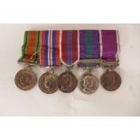 A group of WWII and later military medals, to include Defence medal, 1939-45 medal, Queen