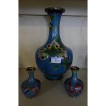 A 20th Century Chinese Cloisonne vase, of baluster form, decorated with foliage together with a