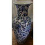 A large contemporary Chinese blue and white vase, decorated with floral design
