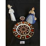 A Royal Dux figurine, a Nao figure of a young girl, Royal Crown Derby circular plate pattern no.