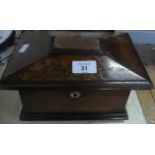 A 19th Century mahogany sarcophagus formed tea caddy with two section interior.