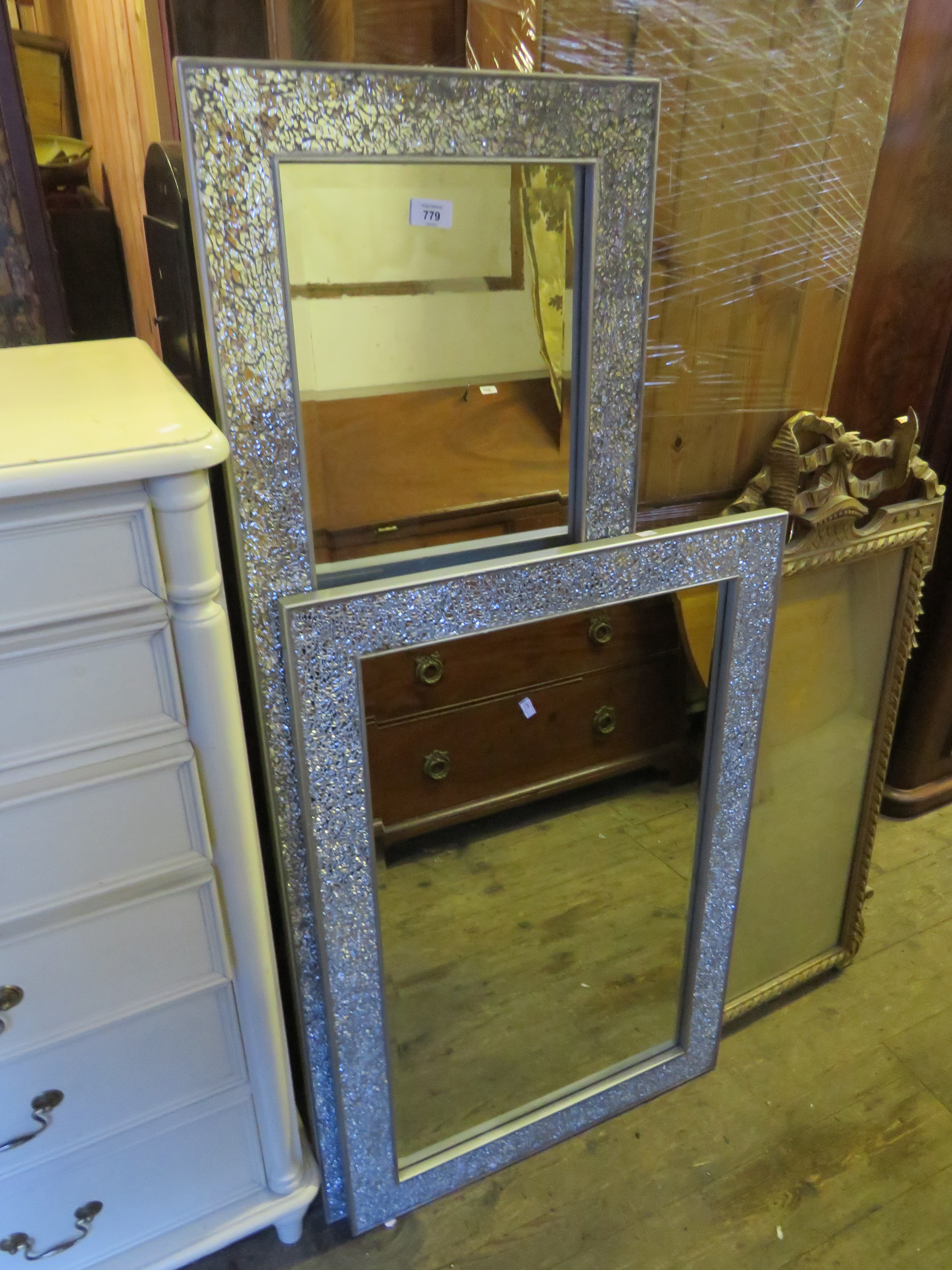 A modern rectangular wall mirror with a mosaic frame, second similar mirror and a 19th Century style