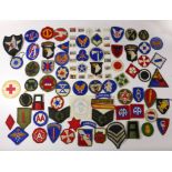 A collection of approx 70 United States of America cloth military badges, to include notepaper