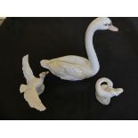 A Lladro model swan, together with two Lladro models of geese (3)