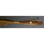 Two Hardy's split cane fishing rods, 'Palakona', each complete with canvas bags and a further two