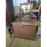 A Victorian walnut dressing table with an arrangement of two short and two long drawers